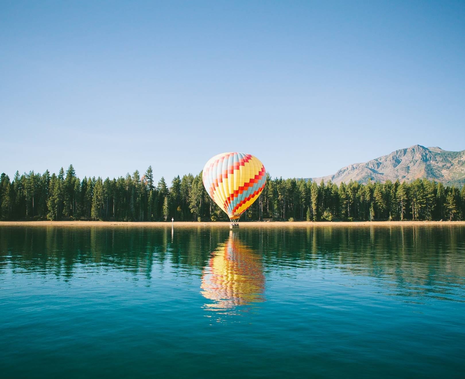 Hot Air Balloon Over Lake